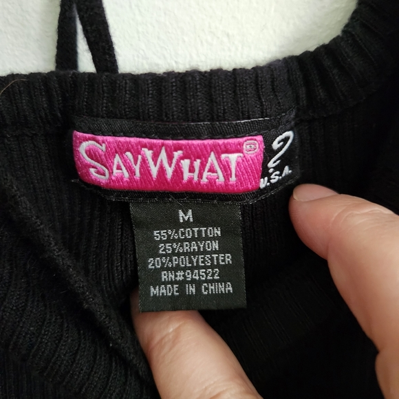 Black ribbed knit dress with tie in the back and bell sleeves. Scoop neck. - Picture 6 of 6